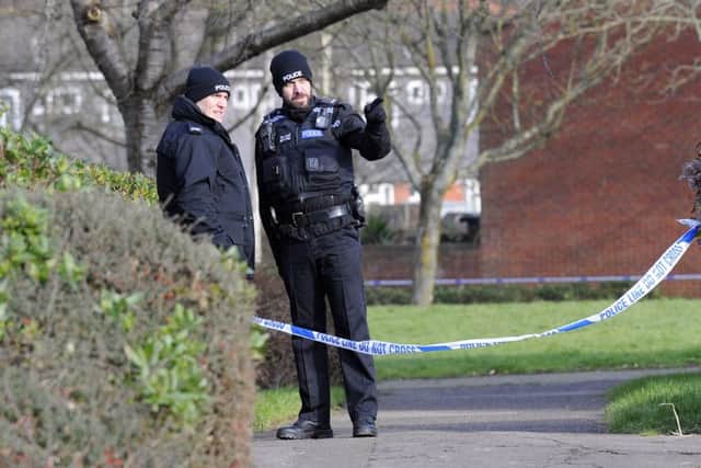 Officers at the scene of a shooting in Crookhorn   Picture:  Malcolm Wells (170213-1919)