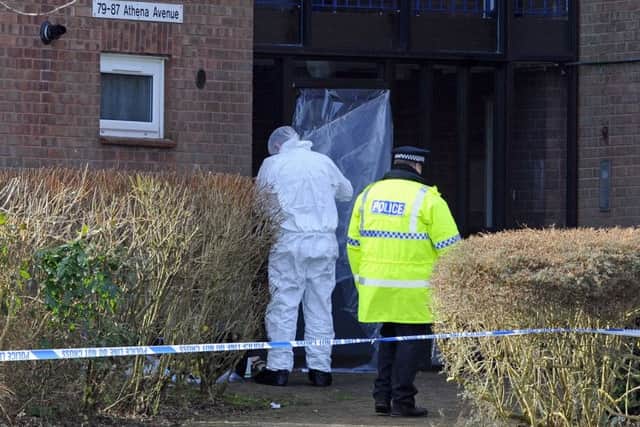 Police at a block of flats in Athena Avenue, Crookhorn, on February 13 after a man was shot at 12.50am. Picture: Malcolm Wells