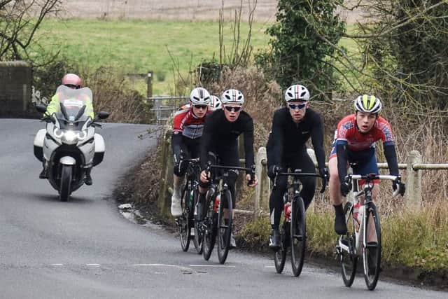 Jacob Vaughan leads Chris Opie, Rory Townsend and Jack Billyard into Boarhunt on the final lap of Portsdown Hill. Picture: Hugh McManus