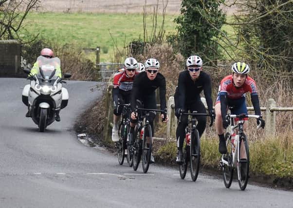 Jacob Vaughan leads Chris Opie, Rory Townsend and Jack Billyard into Boarhunt on the final lap of Portsdown Hill. Picture: Hugh McManus