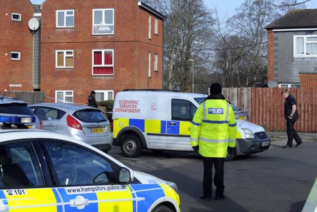 Police officers at the scene of a shooting in Athena Avenue, Crookhorn Picture: Malcolm Wells (170213-1901)