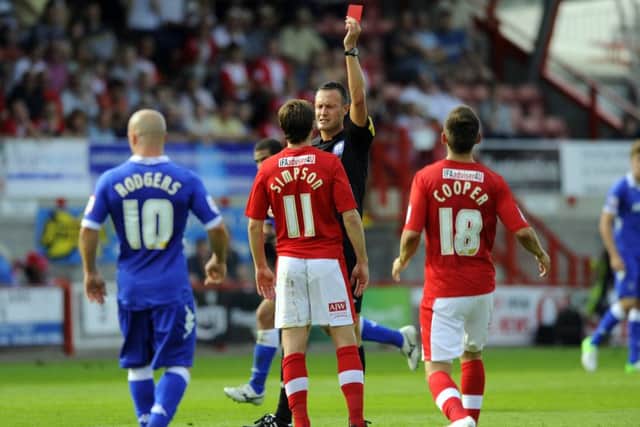 Darren Deadman sends off Crawley's Josh Simpson during Pompey's win at the Red Devils during the 2012-13 League One season