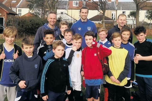 Christian Burgess with the Skilful Soccer Youth under-12s at Bransbury Park in Eastney