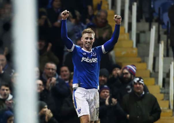 Eoin Doyle celebrates his first goal for new-club Pompey in last night's 2-0 Fratton Park win over Blackpool   Picture: Joe Pepler