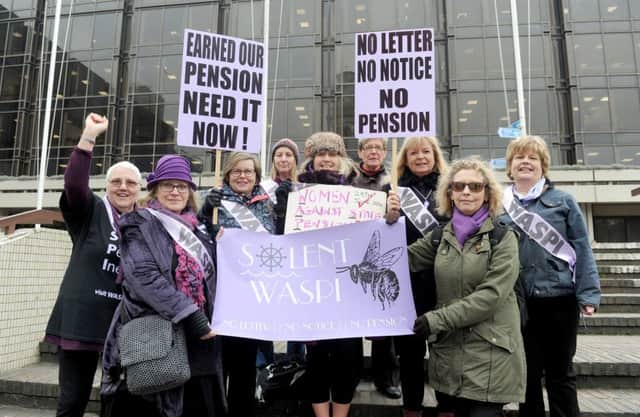 14/2/2017 (EP)

A protest took place in Portsmouth on Valentine's Day against Â£9m cuts being proposed by Portsmouth City Council.
The three council trade unions, Unison, Unite and GMB are working together to oppose the budget cuts.

Pictured is: Solent Waspi were also at the protest. 

Picture: Sarah Standing (170257-6899) PPP-170214-150253001