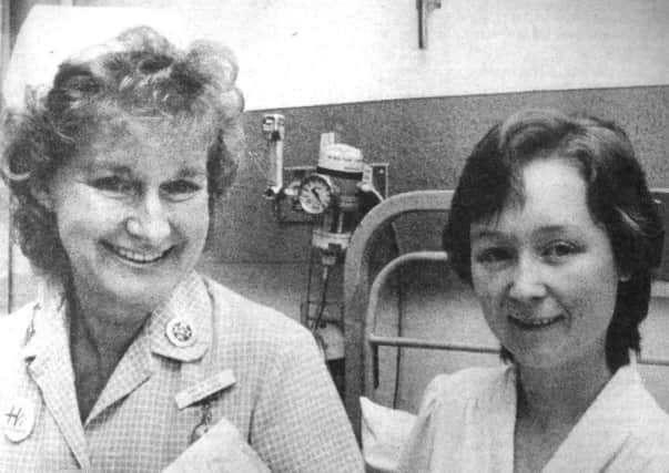 As she waited to be taken to the operating theater for what was expected to be a half-hour operation, Mrs Evans, pictured right, 24, of Kennedy Way, Purbrook, said she was petrified' (6713-1)