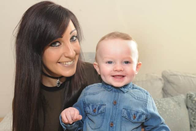 Samantha Miles, 29, from Portsmouth, with her son Joseph Collins (14 months old) winner of The News, Portsmouth Cute Kids competition.
Picture: Sarah Standing (170254-6754)
