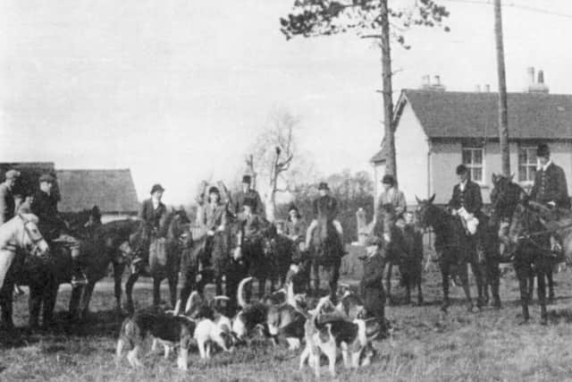The hounds from Stockheath Naval camp  gather with hunters on Stockheath common. To the  left rear is part of the, now demolished, Cricketers Tavern.