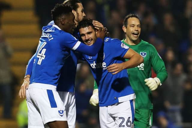 Gareth Evans celebrates scoring against Blackpool before having to be taken off with a shoulder injury Picture: Joe Pepler