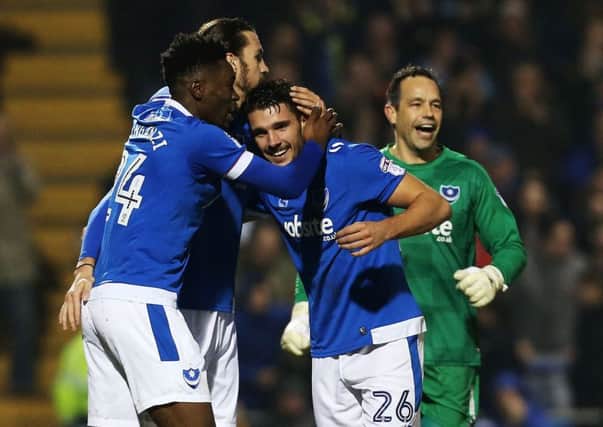 Gareth Evans celebrates scoring against Blackpool before having to be taken off with a shoulder injury Picture: Joe Pepler