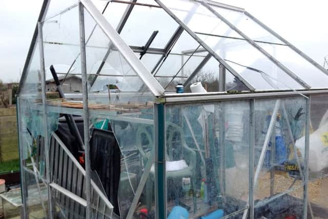 Damage to the sheds and greenhouses at the Eastney and Millton allotments