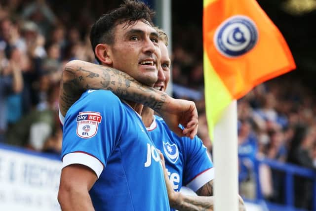 Gary Roberts celebrates scoring against Barnet earlier this season Picture: Joe Pepler