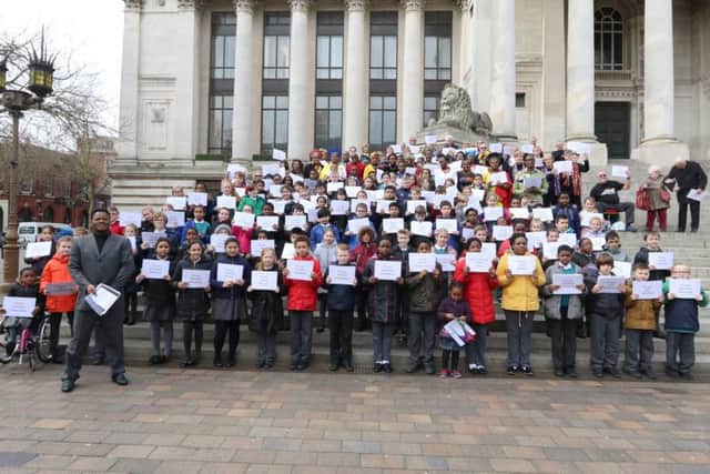 Children fromSt John's Catholic Primary, Chichester Community Choir and South African Diaspora UK sang tradional South African songs