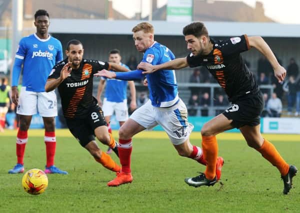 Eoin Doyle in action for Pompey during today's draw at Barnet Picture: Joe Pepler