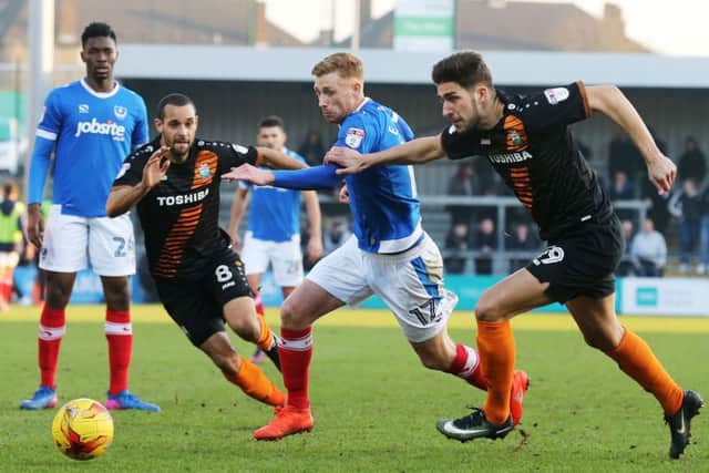Eoin Doyle in action for Pompey during today's draw at Barnet Picture: Joe Pepler