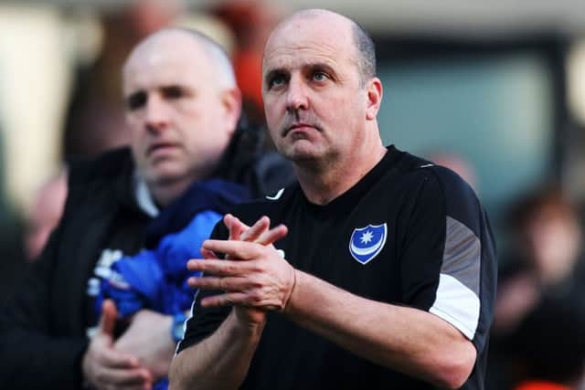 Paul Cook applauds the Pompey fans at the final whsitle Picture: Joe Pepler