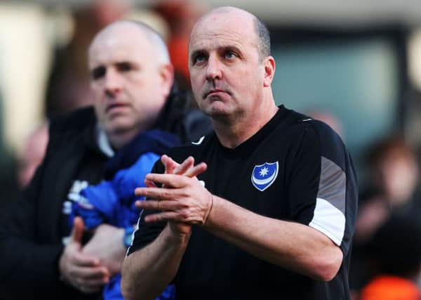 Paul Cook applauds the Pompey fans at the final whsitle Picture: Joe Pepler