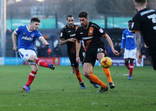 Conor Chaplin scores in the 89th minute for Pompey against Barnet Picture: Joe Pepler
