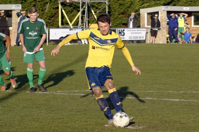 Dan Wooden scores from the penalty spot to help Moneys beat Brockenhurst. Picture: Neil Marshall