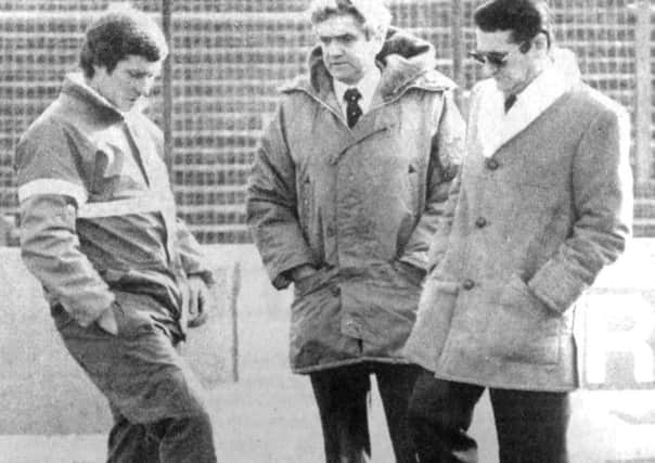 Referee Alan Robinson, centre, is pictured at Fratton Park alongside Pompey manager Alan Ball and secretary Bill Davis (6746-1)