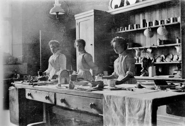 Can you name the kitchen maids in this picture which is owned by Robert Scott