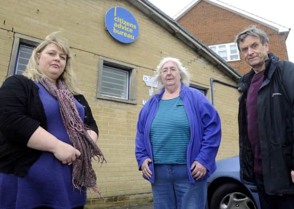 Operations Director Sandy O'Neill, left, with volunteers Bridget Day and Derek Woodhall at Cosham Citizens Advice Bureau which is closing down.
 Picture Ian Hargreaves.