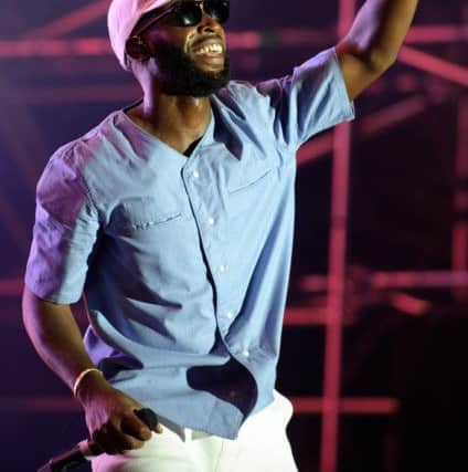 Tinie Tempah performing on the Castle Stage at Victorious Festival, Portsmouth. 2015.
Picture: Allan Hutchings (151290-481)