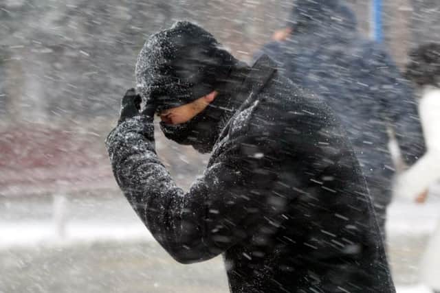 Parts of the UK have already seen snow hitting as Storm Doris continues