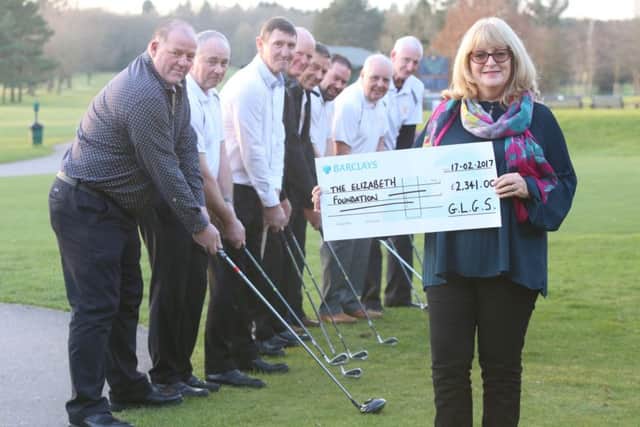 The Golden Lion team and Fiona Heath with the cheque Picture: Habibur Rahman (170247-82)