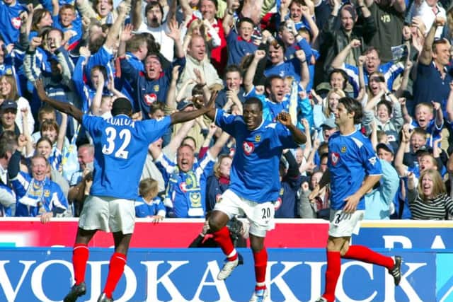 Yakubu celebrates a goal with Lomana LuaLua