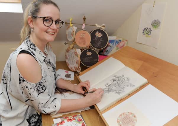 Zoe McCarthy from Waltham Chase, owner of Zoe Barker Textiles in Wickham, designs wedding stationery 

Picture: Sarah Standing (170140-2078)