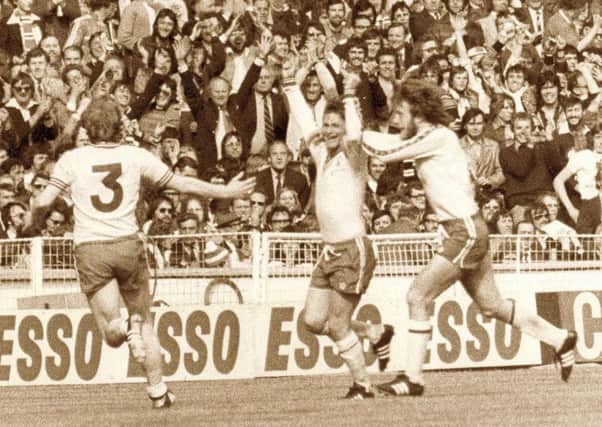 Bobby Stokes celebrates his 1976 FA Cup-winning goal for Pompey's rivals Southampton