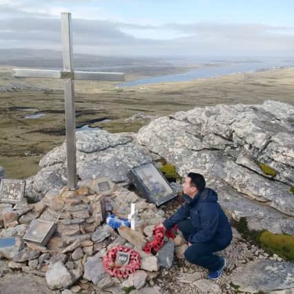 Alan Mak MP pays tribute to British servicemen killed at the Battle of Mount Tumbledown in the Falklands

CAPTION: Alan Mak MP pays tribute to those who were killed during the Falklands War.