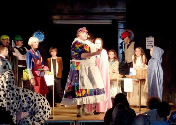 Canon Bob White, centre, dressing up for St Mary's parish pantomime. The panto takes place during February half-term every year.
CAPTION: Canon Bob White, centre, dressed up for the parish pantomime