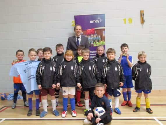 Jubilee 77's under 7s football club, which has recently been provided with new jackets and equipment thanks to Amey, a group that provides highway maintenance service on behalf of Hampshire County Council.
CAPTION: Group photo of the Jubilee 77 under 7s football club.