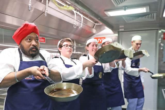 Celebrity Chef Tony Singh judging HMS Queen Elizabeth pancake competition.
Six junior chefs created recipes and cooked them in the galley