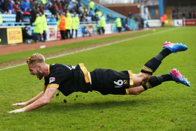 Jack Whatmough celebrates his goal. Picture: Joe Pepler