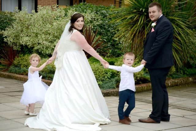 Katie and Ryan Earle with their daughter Ava, 2, and son Harrison, 4. Picture: Mark Robbins Photography