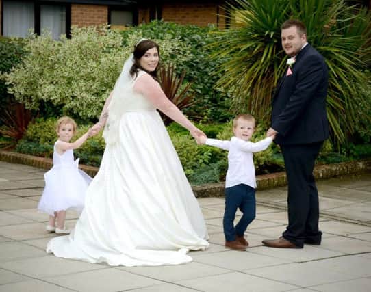 Katie and Ryan Earle with their daughter Ava, 2, and son Harrison, 4. Picture: Mark Robbins Photography