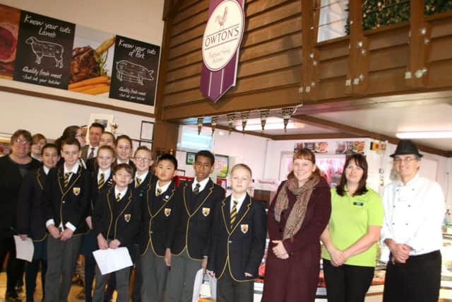 jpns-28-02-17-015 fare lead comm Year 8 pupils from Boundary Oak Year 8 pupils from Boundary Oak School visited the Farm Shop at Garsons of Titchfield in January to learn about local produce from HampshireYear eight pupils from Boundary Oak School in Fareham visit Garsons Farm Shop in Titchfield. Here, the students visited Owton's to find out about the different types of meat and how shopping locally can lead to cooking much tastier dishes.CAPTION: Students from Boundary Oak School learned about the importance of shopping locally