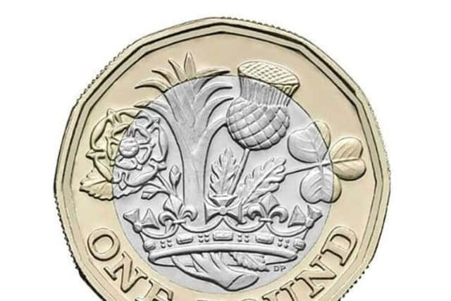 The new Â£1 coin will come into circulation at the end of March. All existing Â£1 coins must be spent or banked by October 31. CAPTION: The new Â£1 coin will come into circulation at the end of March PPP-170220-154602001