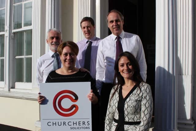 Lawyers from Churchers Solicitors with their new branding. (Left to right) managing partner Ian Robinson, Elizabeth Moger, Nick Eve, Matthew Bailey and Lauren McIntosh