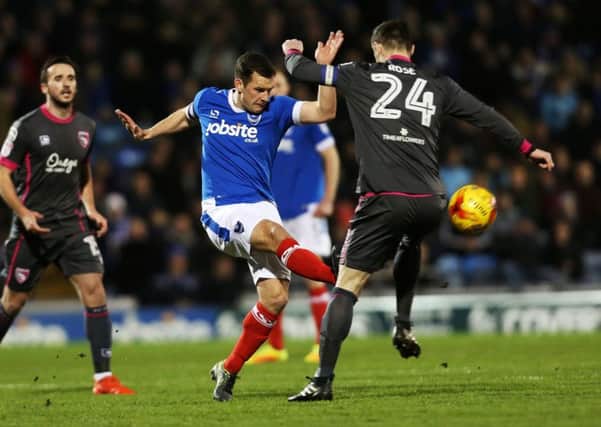 Michael Doyle in action for Pompey against Morecambe. Picture: Joe Pepler