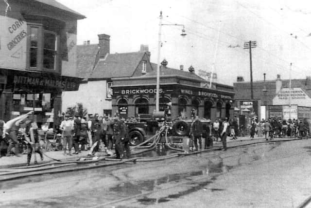 BLAZE Might this picture have been taken when the Co-op building in Fratton Road burned down in 1934?