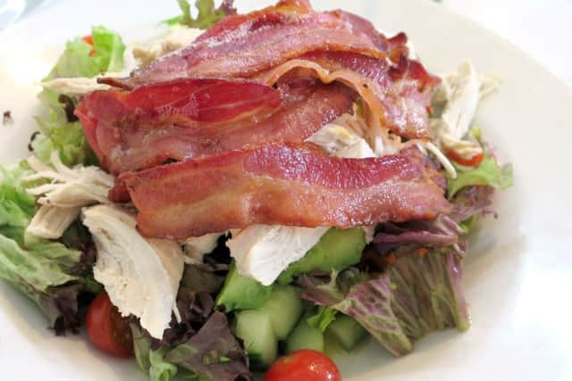 Chicken breast, crispy bacon and avocado salad bowl