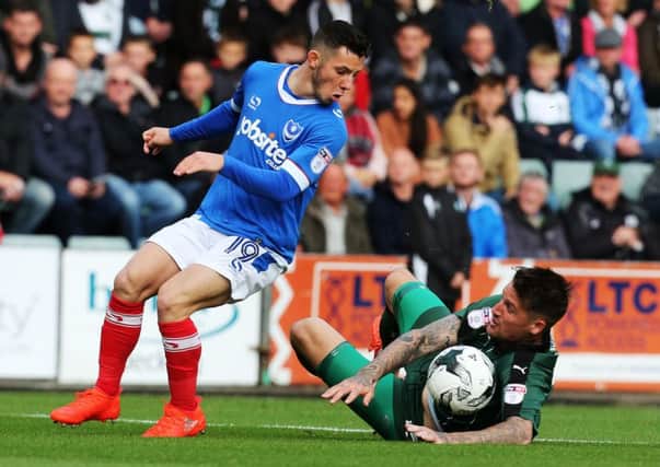 Conor Chaplin and Pompey have a favourable run-in, while Sonny Bradley, right, and his Plymotuh team-mates face a nightmare March. Picture: Joe Pepler