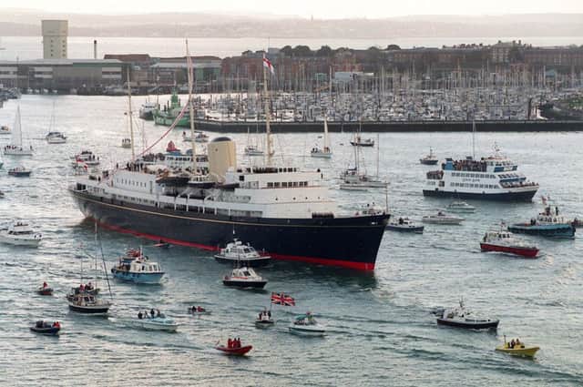 The Royal Yacht Britannia sailing into Portsmouth for the last time before being decommissioned, November 22, 1997.
