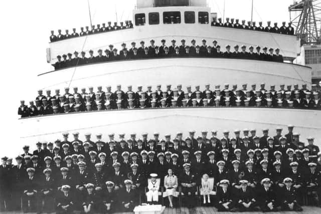 SHIPSHAPE Britannias ships company with the Queen, Prince Philip, Prince Charles and Princess Anne on arrival home from the ships maiden voyage and, above, the two royal children during the same trip