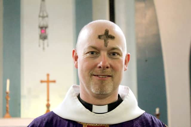 Rev Paul Chamberlain with an Ash Wednesday cross