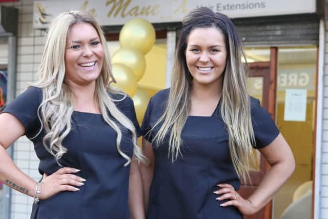 Kaz and Lauren Griffin outside their new business